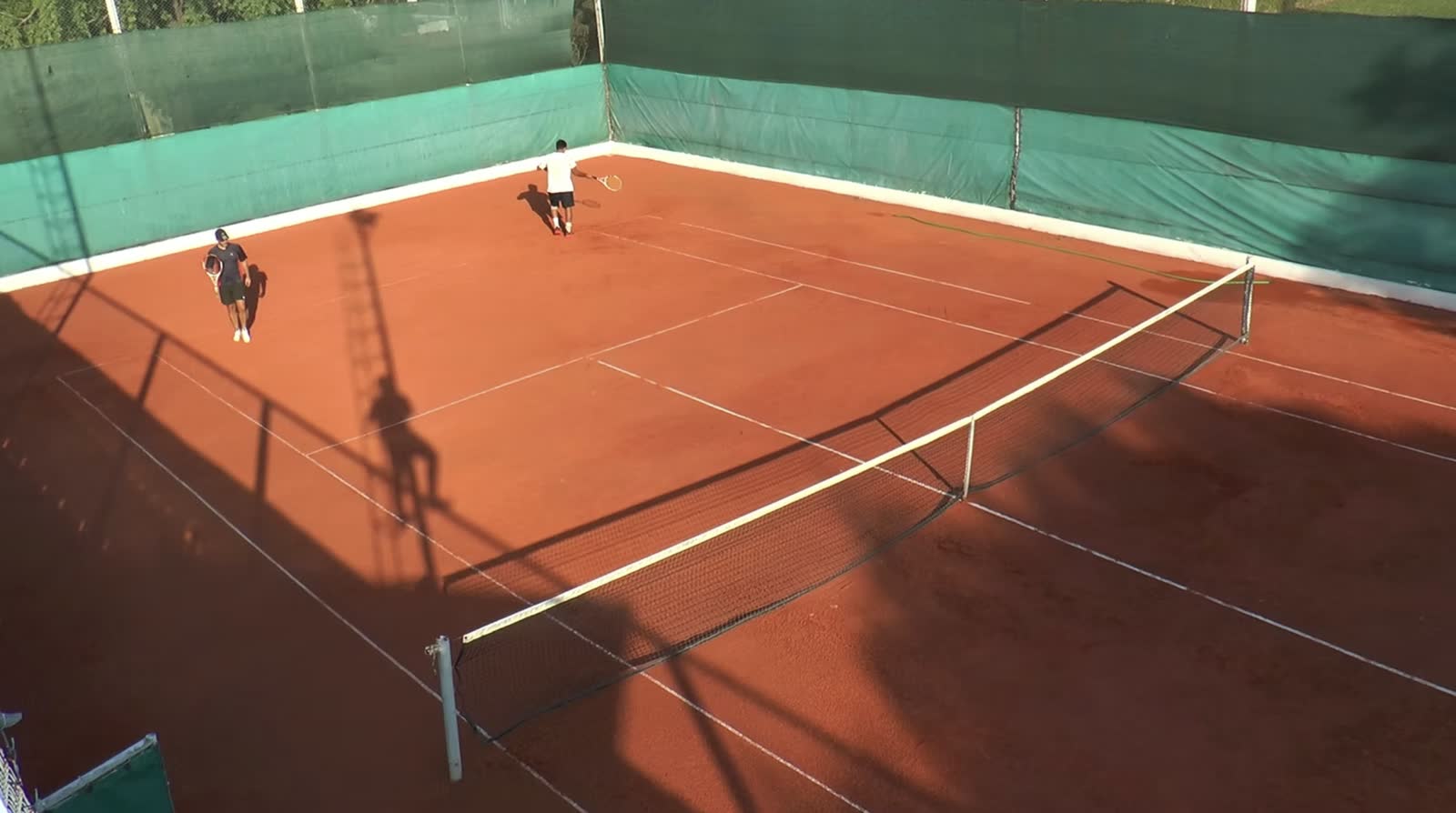 Cancha de tenis de polvo de ladrillo